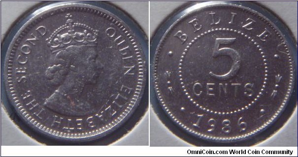 Belize | 
5 Cents, 1986 | 
20 mm, 1.04 gr. | 
Aluminium | 

Obverse: Queen Elizabeth II facing right | 
Lettering: QUEEN ELIZABETH THE SECOND | 

Reverse: Denomination, date below | 
Lettering: • BELIZE • 5 CENTS • 1986 • |