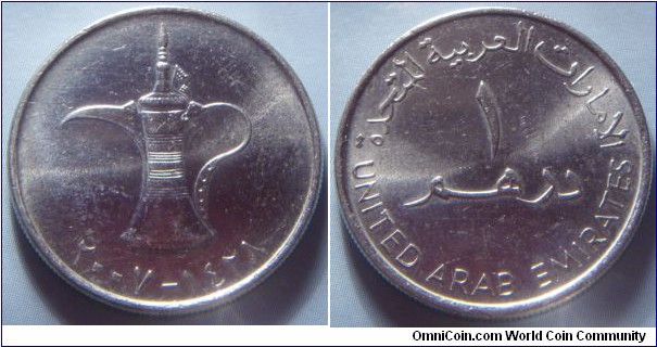 United Arab Emirates | 
1 Dirham, 2007 (1428) | 
24 mm, 6.4 gr. | 
Copper-nickel | 

Obverse: Jug, date below | 
Lettering: ٢٠٠٧ - ١٤٢٨ | 

Reverse: Denomination | 
Lettering: الإمارات العربية المتحدة ١ درهم UNITED ARAB EMIRATES |