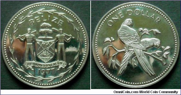Belize 1 dollar.
1977, Franklin Mint.
Scarlet mecaw parrot on reverse.