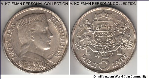 KM-9, 1931 Latvia 5 lati; silver, lettered edge; about uncirculated, some bag marks and light toning.