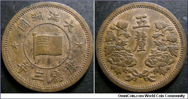 China Manchukuo 1936 5 li. A rather scarce coin in any condition!!! Strong aUNC details - a bit of shame for the nick at 11 o'clock. Weight: 3.50g