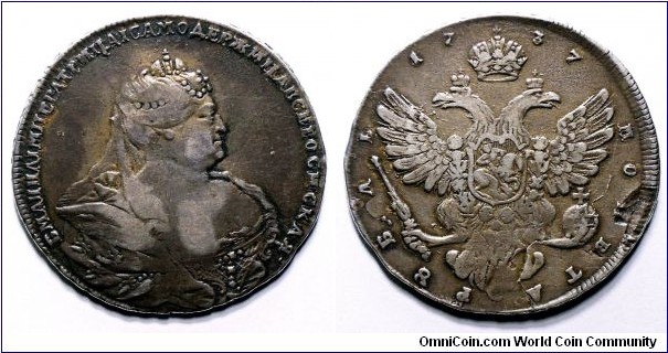 Russia, Anna (1730-1740), Rouble, 1737. 25.79g. By Dmitriev after Hedlinger. Obverse legend begins and ends with dot. Bit - unlisted, Diakov 28, Sev 1264 (S). Uzd 0731. Reverse planchet flaw. Nearly very fine - very fine.