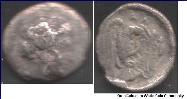 Chalkis in Euboia silver drachm. Hera obverse, with eagle carrying trophy while eating snake reverse. Obverse VERY three dimensional and difficult to scan.