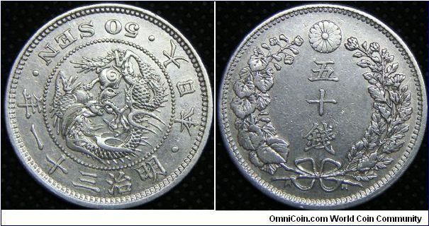 Mutsuhito (Meiji) Empire, 50 Cents, Year 31 (1898), Observe: Dragon within beaded circle with 3 legends seperated by dots around border. 13.4800 g, 0.8000 Silver, .3472 Oz. ASW. VF.