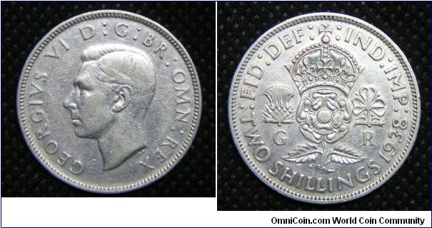 King George VI, Two Shillings (Florin), 1938. 11.3104 g, 0.5000 Silver, .1818 Oz. ASW., 28.3mm, Mintage: 7,909,000 units. Good VF.