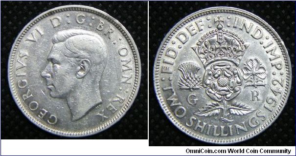 King George VI, Two Shillings (Florin), 1942. 11.3104 g, 0.5000 Silver, .1818 Oz. ASW., 28.3mm, Mintage: 39,895,000 units. Good VF.