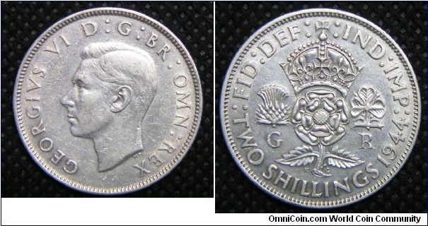 King George VI, Two Shillings (Florin), 1944. 11.3104 g, 0.5000 Silver, .1818 Oz. ASW., 28.3mm, Mintage: 27,560,000 units. Good VF.