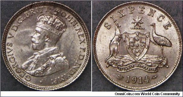 George V 6 Pence (8 Pearls), 1914 London Mint. Crisply struck with all details showing, including the 8 pearls on the crown. Just modestly circulated with plenty of remaining luster. Sharp rims.  No significant contacts. Choice about uncirculated. Rare in this condition.