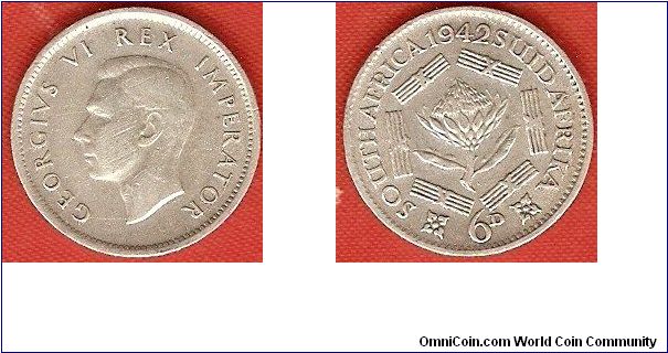 6 pence
George VI, king and emperor
protea flower
0.800 silver