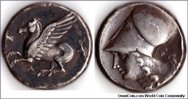 silver stater from the Corinthian colony of Anaktorion in Akarnania. `A' below Pegasus, and DI under Athena's Helmet 