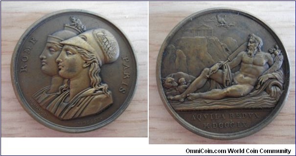 1809 Napoleon Rome, The Second Capital of The Empire, Reunion of Rome To The Empire Medal by Andrieu & Denon. Bronze 41MM.
Obv: ROME PARIS, Two accollate busts l., Rev: A river god reclining left, a wolf & child before him, a temple on the height in the left background. Aloft is an eagle carrying a thunderbolt. Signed on the exergual bar, ANDRIEU & DENON. Exergue: AQVILA REDVX MDCCCIX.