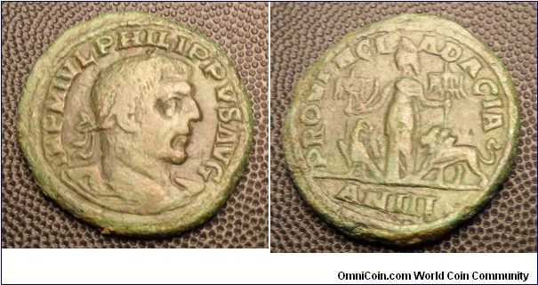 RARE,
PHILIP I 	DACIA, Æ 29, Obv. IMP M IVL PHILIPPVS AVG, Laureate draped bust right. Rev. PROVINCIA DACIA, Dacia standing facing between eagle and lion holding curved sword and two standards inscribed V and XIII, AN III in exergue. 13.3gm V11