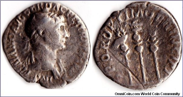 Trajan denarius struck at Rome circa 112 ad. Obverse bust of Trajan. Revers legionary eagle between two standards legend `SPQR Optimo Principi'
