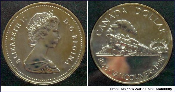 Canada 1 dollar.
1986, Vancouver Centennial, Ag 500.