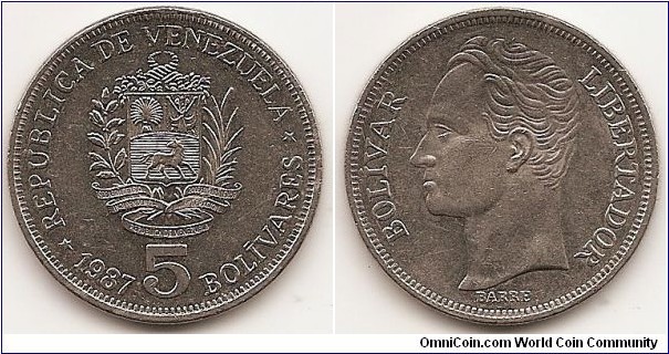 5 Bolivares
Y#53.2
15.0000 g., Nickel, 31 mm. Obv: National arms above ribbon, plants flank, cornucopias above, date and denomination below, five-pointed stars Rev: Head of Bolivar left Edge: Reeded