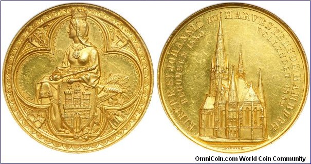 1882 German Hamberg Nachtrag 10 Ducat in completion of St. Johannishriche Harvestehude Medal by J. J. Lorenze  . AU 42.5MM./36.6 gm. 
Obv: Hammonia with Hamburg city arms and scepter in her right hand sits on left around quatrefoil Rev: View of St. Johns Church. 
