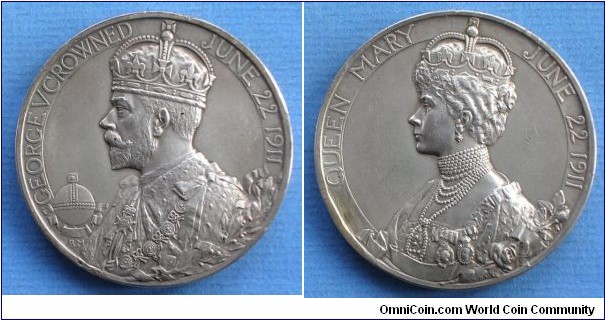 1911 UK George V Coronation Medal by Bertram Mackennal. Silver 51MM./87 gm.
Obv: Bust of George V facing left. Rev: Bust of Queen Mary facing left 
