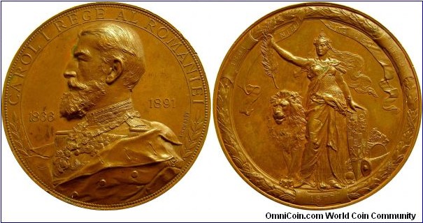 1891 Romania King Carol I Anniversary of 25 Year Reign Medal. Bronze 64MM./127.4 gm.
Obv: Bust of Charles I of Romania on the left, around 1866 to 1891. Rev: R/NIHIL - SINE DEO. Allegory helmet holding a palm & the crown of Romania, behind a lion at the bottom in 1877.
