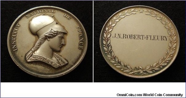 Unique 1850 France Institute National De France Medal awarded to Artist Joseph Nicolas Robert-Fleury engraved by Dumarest F. Silver 50MM./65 gm. 
Edge stamped ARGENT with pointing finger represent date between 1845-1860.
