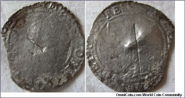 Irish 3rd coinage shilling, struck afetr the 24th may 1602, as this was the day the Mintmark was changed to the Marlet