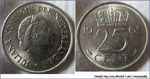 1965 25 cents, EF, struck with a worn die