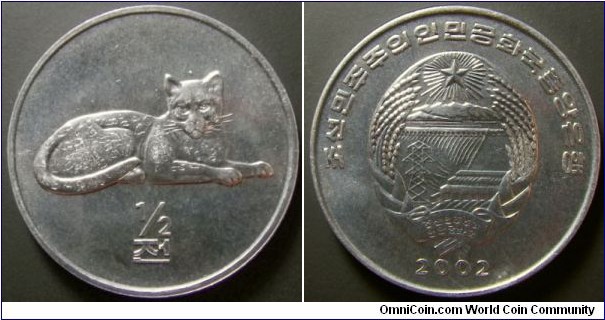 North Korea 2002 half chon commemorating a leopard. Weight: 2.20g. 