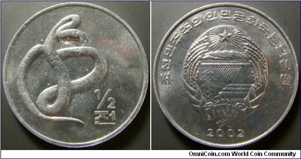 North Korea 2002 half chon commemorating a snake. Weight: 2.17g. 