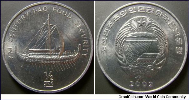 North Korea 2002 half chon commemorating a Korean iron clad boat. Weight: 2.19g. 