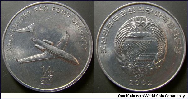 North Korea 2002 half chon commemorating a plane. Weight: 2.20g. 
