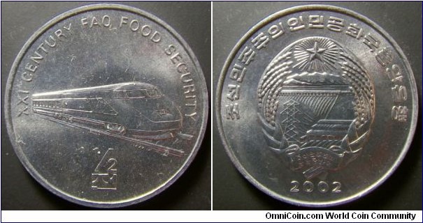 North Korea 2002 half chon commemorating a train. Weight: 2.19g. 