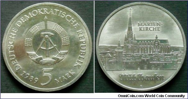 German Democratic Republic 5 mark.
1989, Thomas Munster's 500th birthday. St. Mary's Church in Muhlhausen. Marien-Kirche (GDR, East Germany)