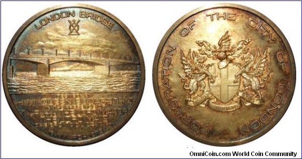 1973 UK London Bridge Medal #498. Gold gilded Silver: 51.5MM./54.15 gm. Mintage: 2,250
Obv: A view of the new bridge, text commemoration opening below. Rev: Crest of City of London. Edge: #487
