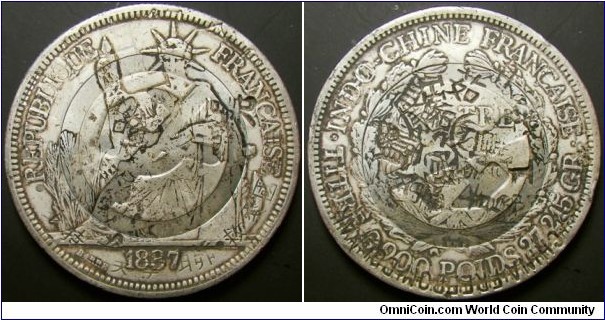 French Indo-China 1887 piastre. Heavily chopmarked and again chopmarked in 1989 for the Tiananmen anti-communist movement. Weight: 27.02g. 