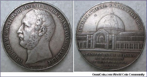 1862 UK Prince Albert International Exhibition in Crystal Palace Medal by Schnitzspabn F & J. Wiener . Silver: 41MM.
Obv: Bust of Prince Albert face left. Legwnd TO THE COMMEMORATION OF HIS LATE R.H.THE PRINCE CONSORT ALBERT. Rev: View of the Crystal Place, Legend INTERNATIONAL EXHIBITION 1862 STAMPED IN THE BUILDING BY H. UHLHORN OF GREVENBROICH. PRUSSIA. signed J. Wiener
