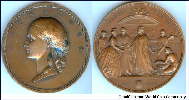 1863 UK Entry of Princess Alexandra into The City Of London medal by J.S. & A.B. Wyon. Bronze: 77MM. Mintage: 350
Obv: Bust of The Princess of Denmark Alexandra facing left. Her Hair pulled back by lovelock over shoulder. Legend  ALEXANDRA. Rev: City of London welcomes Princess led by Prince of Wales & introduced the Princess to Londonia, on left is Hyman and on right are Peace and Plenty. Legend WELOCME ALEXANDRA. Exergue: MAR: 1863 seperated by The Arms of The City of London.
