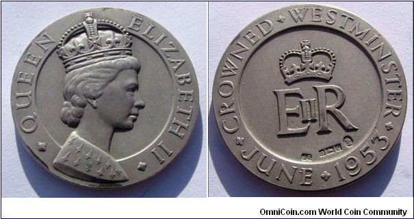 1953 UK Queen Elizabeth II Coronation Medal. Silver: 1.5 inches/28 gm.
Obv: Crowned bust to left. Legend QUEEN ELIZABETH II around. Rev: EIIR with Crown above and hallmarks below. Lengend CROWNED WESTMINSTER JUNE 1953.
