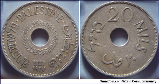 Palestine | 
20 Mils, 1927 | 
30.5 mm, 11.33 gr. | 
Copper-nickel | 

Obverse: Olive wreath surround centre hole, year below | 
Lettering: (פלשתינה (א