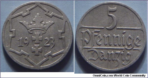 Danzig | 
5 Pfennige, 1923 | 
17.5 mm, 2 gr. | 
Copper-Nickel | 

Obverse: Coat of Arms divide date within snowflake design | 
Lettering: 1923 |

Reverse: Denomination | 
Lettering: 5 Pfennige Danzig |