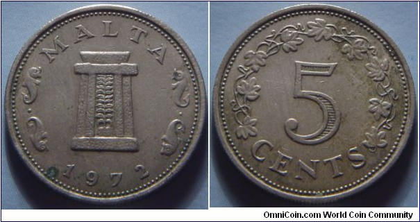 Malta | 
5 Cents, 1972 | 
23.6 mm, 5.65 gr. | 
Copper-nickel | 

Obverse: Ritual altar in the temple of Ħaġar Qim, date below | 
Lettering: MALTA 1972 | 

Reverse: Denomination within wreath of vine leaves | 
Lettering: 5 CENTS |