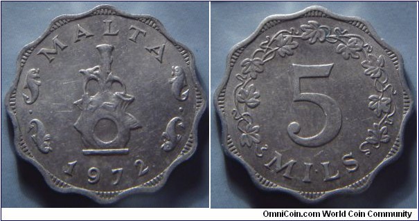 Malta | 
5 Mils, 1972 | 
26 mm, 2.1 gr. | 
Aluminium | 

Obverse: A water carrier | 
Lettering: MALTA 1972 | 

Reverse: Denomination within wreath of vine leaves | 
Lettering: 5 MILS |