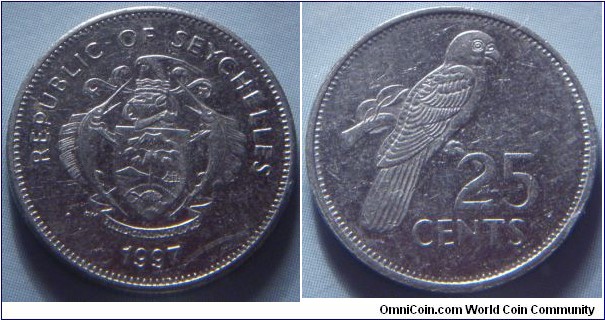 Seychelles | 
25 Cents, 1997 | 
18.9 mm, 2.97 gr. | 
Nickel plated Steel | 

Obverse: National Coat of Arms, date below | 
Lettering: REPUBLIC OF SEYCHELLES • 1997 • | 

Reverse: Black Parrot, denomination below | 
Lettering: 25 CENTS |