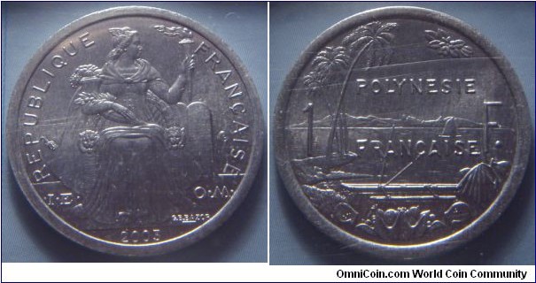 French Polynesia | 
1 Franc, 2003| 
23 mm, 1.3 gr. | 
Aluminium | 

Obverse: Seated Liberty on throne holding lit torch and assorted fruit facing right, date below | 
Lettering: REPUBLIQUE FRANÇAISE I•E • O•M• 2003 | 

Reverse: Palm trees on left, sailboat at sea min centre, mountains in distance. Boat with outrigger in foreground with assorted fruit in container, divide denomination| 
Lettering: POLYNESIE FRANÇAISE 1 F. |