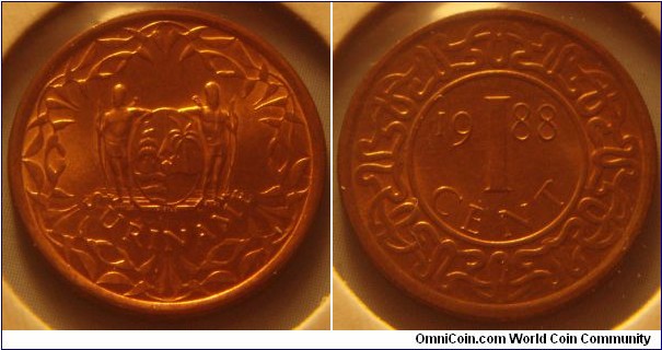 Suriname | 
1 Cent, 1988 | 
18 mm, 2.5 gr. | 
Copper plated Steel

Obverse: National Coat of Arms | 
Lettering: SURINAME | 

Reverse: Denomination divide date | 
Lettering: 1 CENT 1988 |