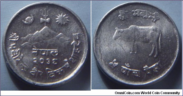 Nepal | 
5 Paisa, 1979 (2036) | 
20.5 mm, 1.14 gr. | 
Aluminium | 

Obverse: Trident with sun and moon flanking above Himalayas, date below | 
Lettering: नेपाल २०३६ श्री प वीरेन्द्र वीर विक्रम शाहदेव | 

Reverse: Cow facing left, denomination below | 
Lettering: श्री भवानी ५ पाँच पैसा |