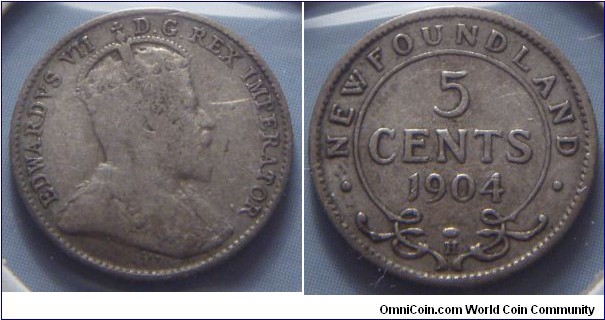 Newfoundland | 
5 Cents, 1904 | 
15.4 mm, 1.18 gr. | 
Silver (.925) | 

Obverse: King Edward VII facing right | 
Lettering: EDWARDVS VII D.G. REX IMPERATOR | 

Reverse: Denomination, date below | 
Lettering: • NEWFOUNDLAND • 5 CENTS 1904 H |