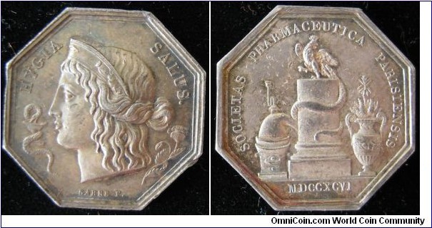 1845 - 1860 France Pharmaceutical Society of Paris Jeton by Barre . Silver: 30MM./13.2 gm.
Obv: Godess Hygiea left, a snake on left & flora on right. Legend HYGIA SAEUS signed BARRE F. Obv: Eagle stand on platform with snake surround. Legend SOCIETAS PHARMACEUTICA PARISIENEIS MDCCXCVI.
