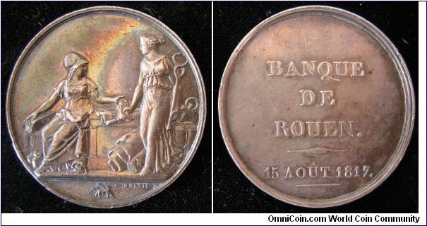 1817 France Bank of Rouen Jeton. Silver: 34MM
Obv: Athena seating on left with cornucopia  & Ceres standing on right holding caduceus. Rouen emblem at bottom & signed Dubois.  Rev: Legend BANQUE DE ROUEN 15 AOUT 1817.
