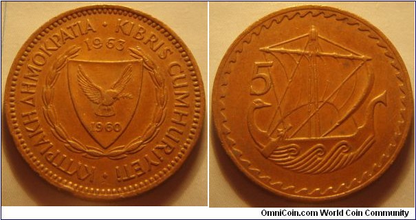 Cyprus |
5 Mils, 1963 | 
25 mm, 5.74 gr. | 
Bronze | 

Obverse: National Coat of Arms with the independence year 1960 | 
Lettering: • ΚΥΠΡΙΑΚΗ ΔΗΜΟΚΡΑΤΙΑ • KIBRIS CUMHURİYETİ | 

Reverse: Ancient sail boat, denomination left | 
Lettering: 5 |