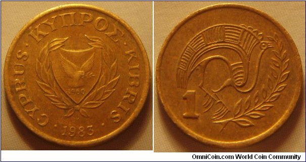 Cyprus |
1 Sent, 1983 | 
16.5 mm, 2 gr. | 
Nickel-brass | 

Obverse: National Coat of Arms with the independence year 1960, date below | 
Lettering: • CYPRUS • ΚΥΠΡΟΣ • KIBRIS • 1983| 

Reverse: Stylized bird in front of a tree branch from a jug of bichrome ware of the Cyproarchaic period, denomination left | 
Lettering: 1 |