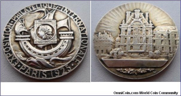 1925 France Paris Philatelic Exposition Medal. Silver: 36MM.
Obv: Coat of Arms of city of Paris centered by a Stamp & surrounding legend EXPOSTION PHILATELIQUE INTERNATIONALE/PARIS 1925 signed Henry Cheffer. Rev: Paris townhall.

